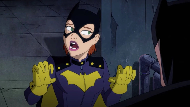 Barbara Gordon looking worried at Batman