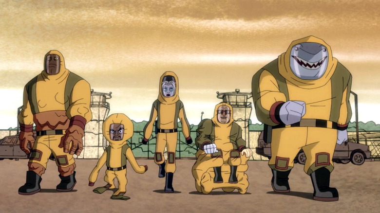 Harley and crew wearing prison jumpsuits