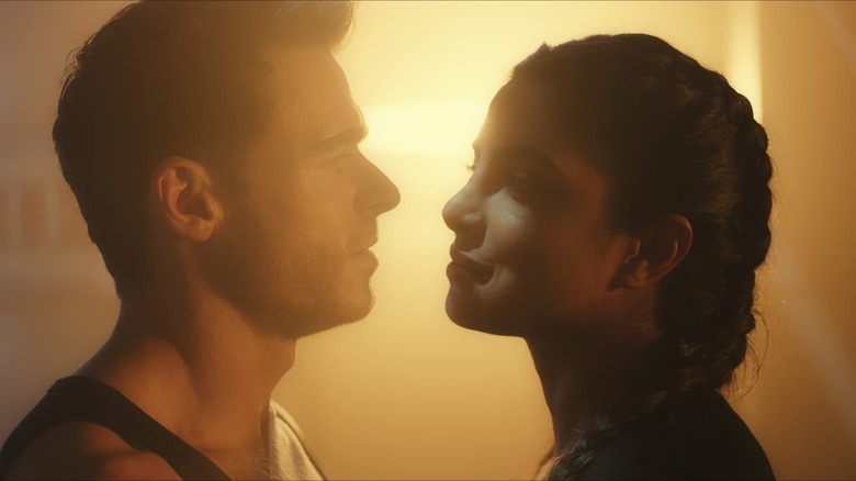 Richard Madden as Mason Kane and Priyanka Chopra Jonas as Nadia Sinh stare at each other in Citadel