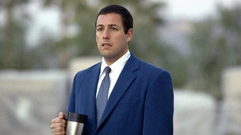 Adam Sandler Punch-Drunk Love blue suit holding coffee cup