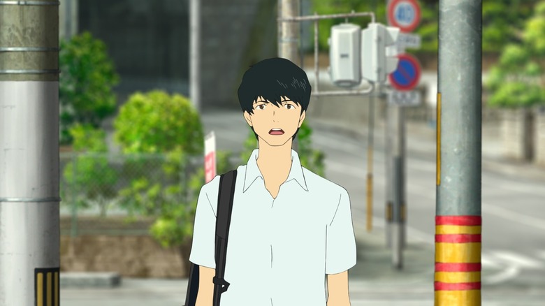 Shinobu standing at a crosswalk in Belle