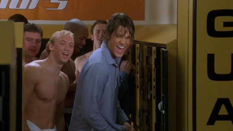 Jared Padalecki laughing in a locker room in Cheaper by the Dozen