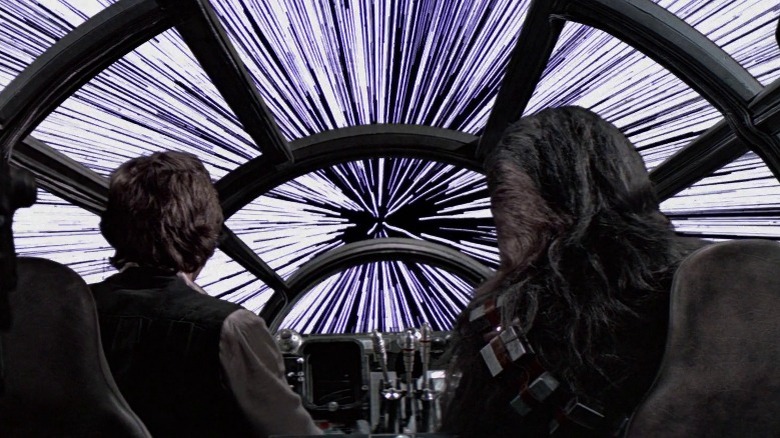 Han and Chewbacca traveling at lightspeed in the Millennium Falcon