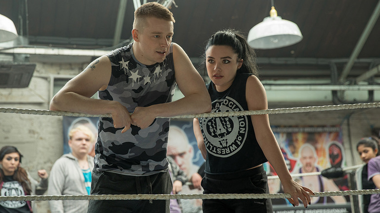 Florence Pugh and Jack Lowden lean against ropes in Fighting With My Family