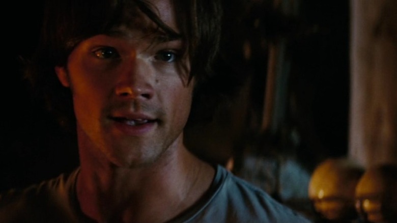 Jared Padalecki lit by firelight in Friday the 13th 2009