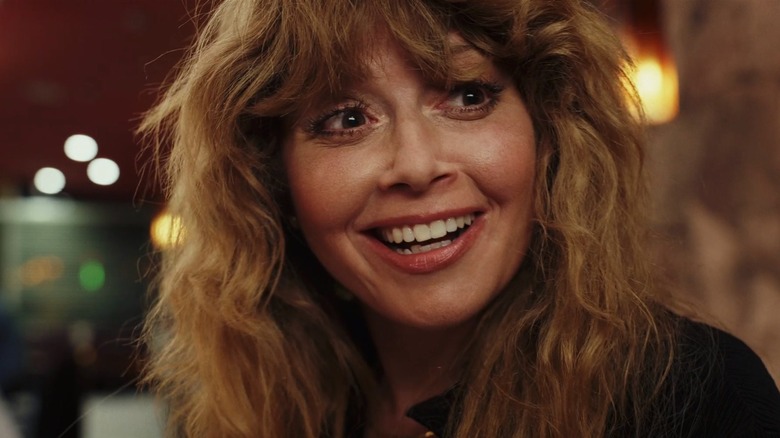 Closeup of Natasha Lyonne smiling widely