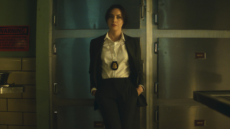 Rio in cop outfit in morgue Agatha All Along