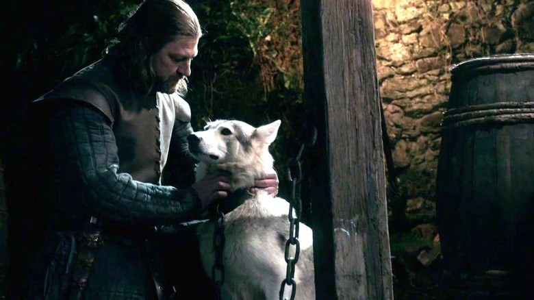 Sean Bean petting white dog Game of Thrones