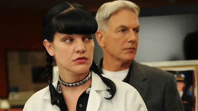 NCIS Jethro stands behind Abby