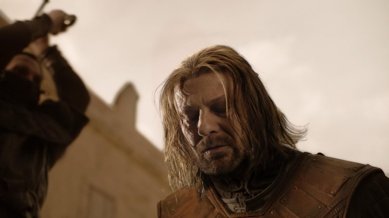 Sean Bean kneeling outside Game of Thrones