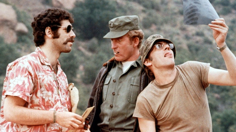 Elliot Gould, Robert Duvall, and Donald Sutherland in M*A*S*H (film)